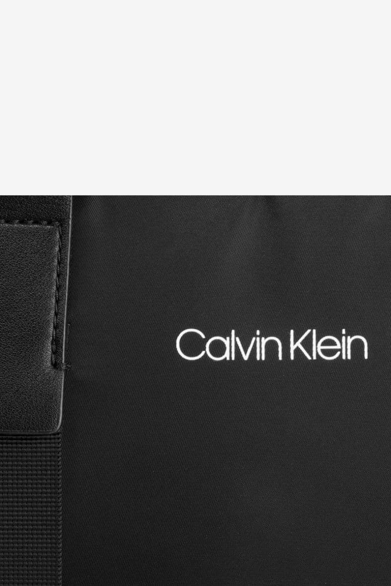 CALVIN KLEIN BRACED — vue 2