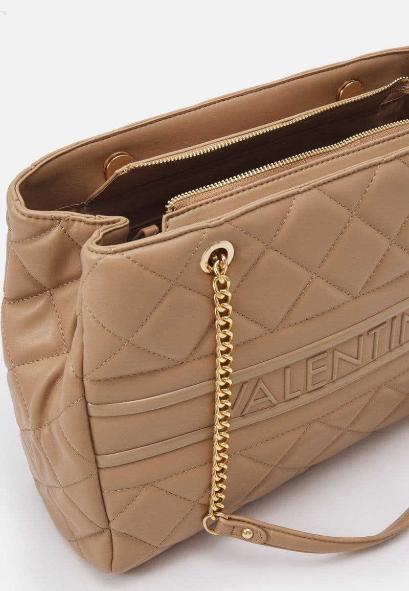 VALENTINO BAGS — vue 3